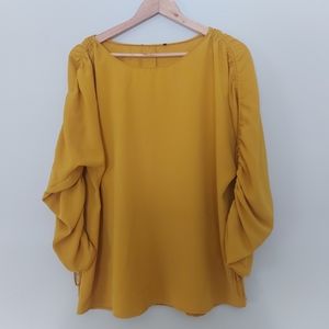 Yellow scrunched sleeved top